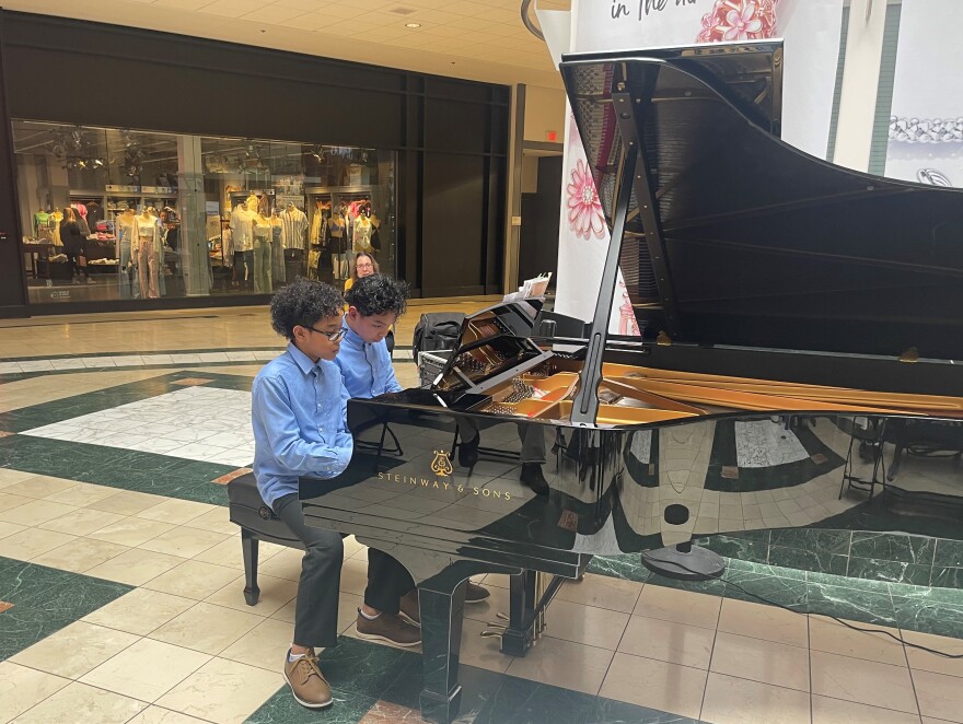 brothers at Lehigh Valley mall on piano