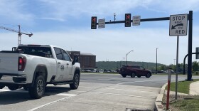 Red arrow stoplights for The Road Scholar