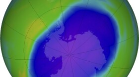 In this false-color image, the blue and purple show the hole in Earth's protective ozone layer over Antarctica on Oct. 5. Earth's ozone layer is slowly but noticeably healing.