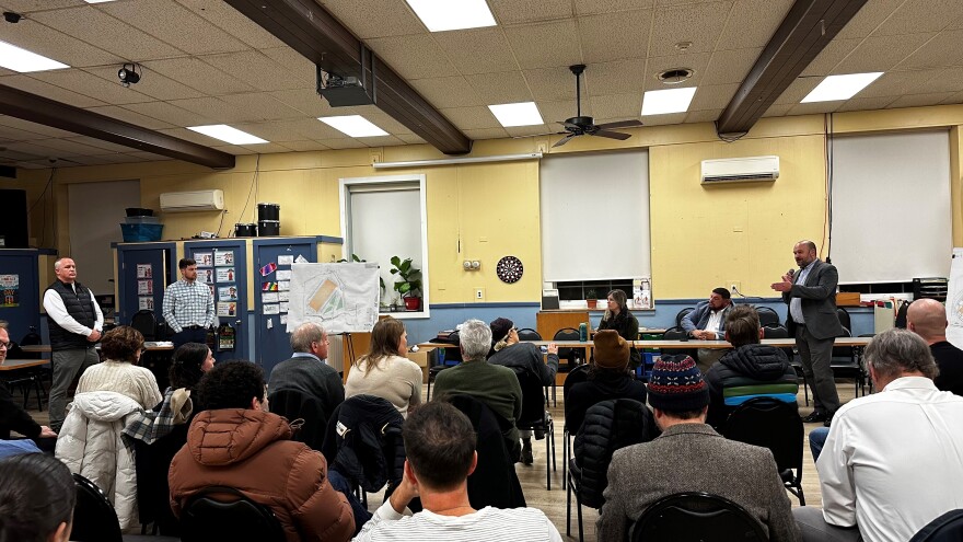 People attend a meeting at Easton Area Community Center
