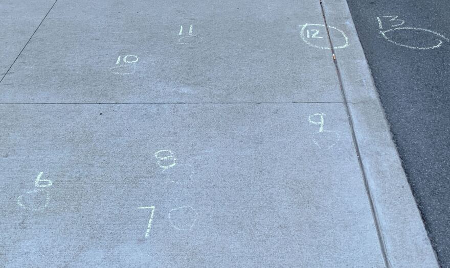 Evidence marks from police-involved shooting near Eighths