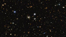 Hundreds of galaxies appear in this image, which combines near-infrared colors captured by Webb's telescope with those from Hubble.