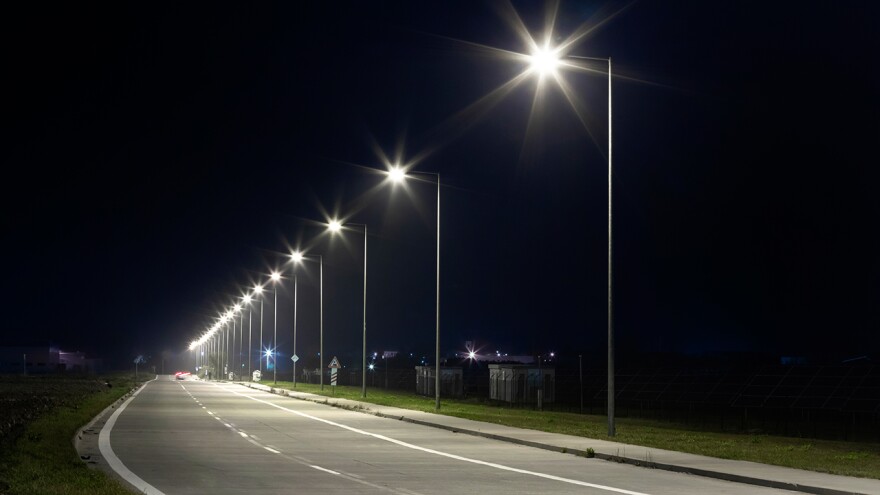 a long row of modern LED street lights