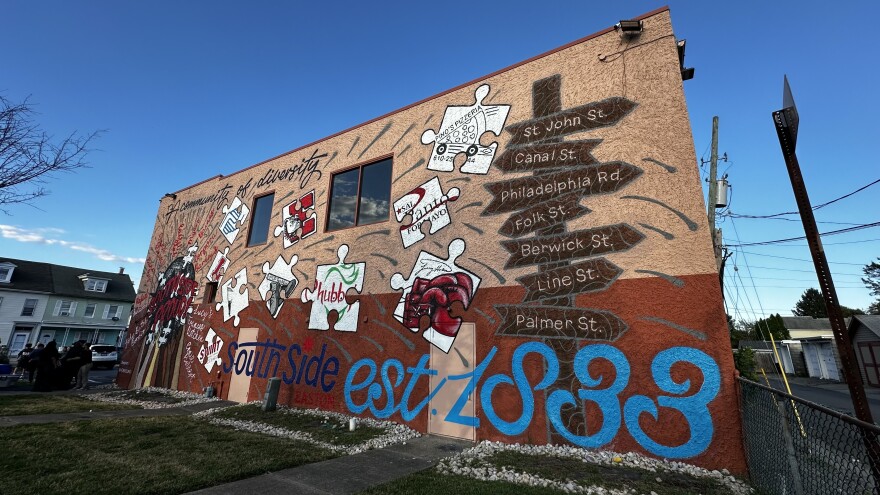 A painted mural on the side of a building