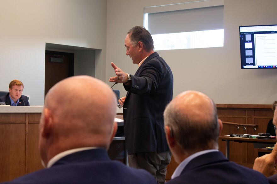 J.P. Mascaro, surrounded by his business associates, makes his company's pitch to South Whitehall Township's board in a Monday night meeting.