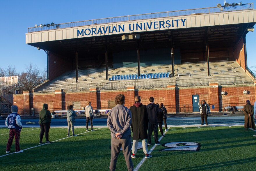 Nicole Bellesfield running a "box" drill with Moravian marching band