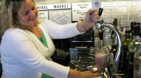 Gina Chersevani makes a Red, White and Blue Float at her restored soda fountain in Washington, D.C.