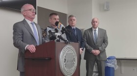 Houck glass news conference.jpg