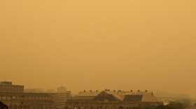 A thick haze and smoke blankets Bethlehem in early afternoon.