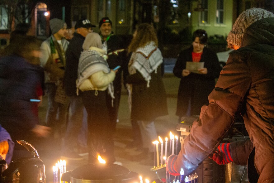 Supporters of Palestinians in Gaza at the Bethlehem menorah lighting on Tuesday night