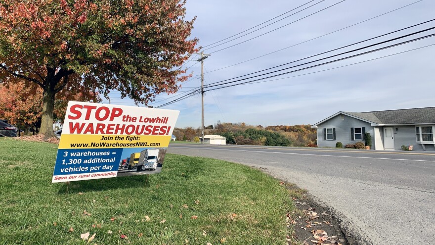 A sign protesting new warehouses in Lowhill Township.