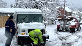 Mail truck stuck in snowstorm Feb. 13, 2024