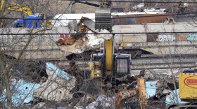 Workers continue to clean up remaining tank cars, Tuesday, Feb. 21, 2023, in East Palestine, Ohio, following the Feb. 3 Norfolk Southern freight train derailment.